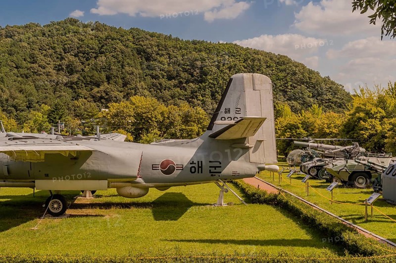 Daejeon, South Korea. September 19, 2019: Grumman S-2e tracker aircraft along with other military vehicles on display at National cemetery