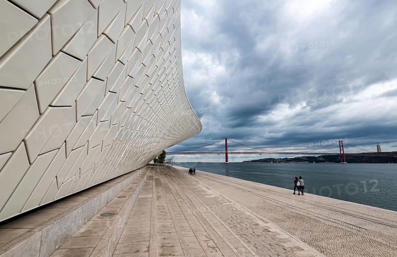 LISBON, PORTUGAL, October 19, 2018: The modern MAAT (Museu de Arte, Arquitetura e Tecnologia) building with futuristic architecture in Lisbon, Portugal in the evening