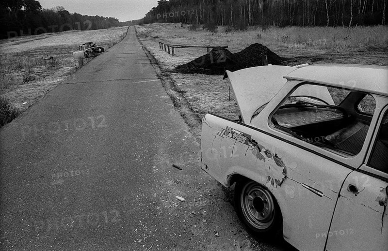 Germany, Berlin, 18.12.1991, access road to the exclave Steinstücken, former wall strip, destroyed Trabant, Europe