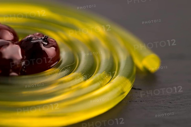 Molecular fruit spaghetti with rowan in syrup