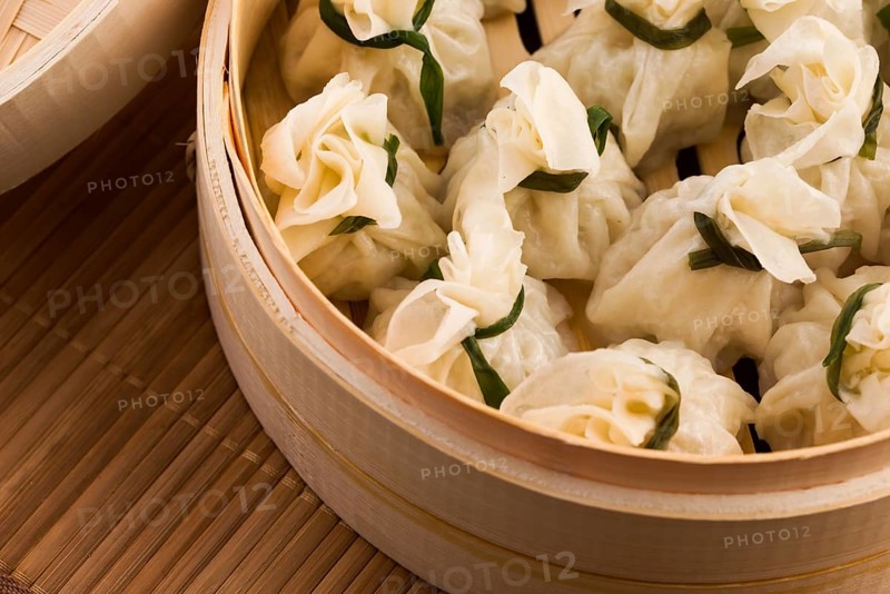 Chinese dumplings in bamboo steamers