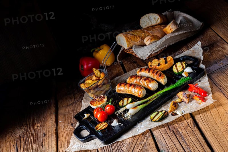 Delicious grilled sausage with various grilled vegetables