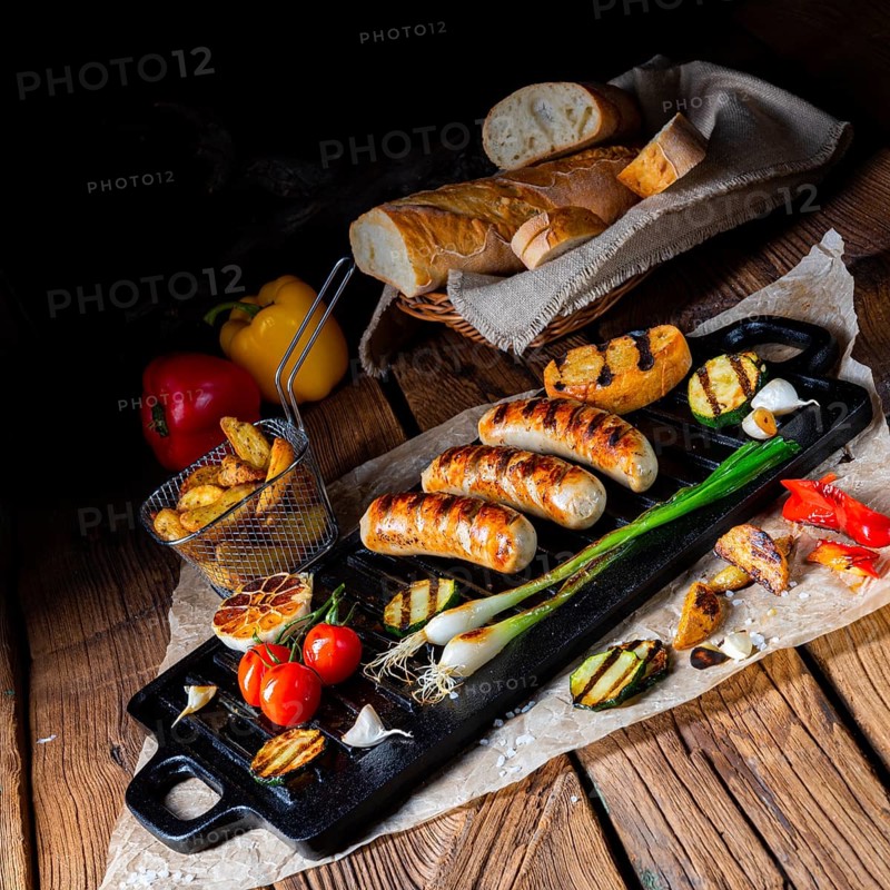 Delicious grilled sausage with various grilled vegetables