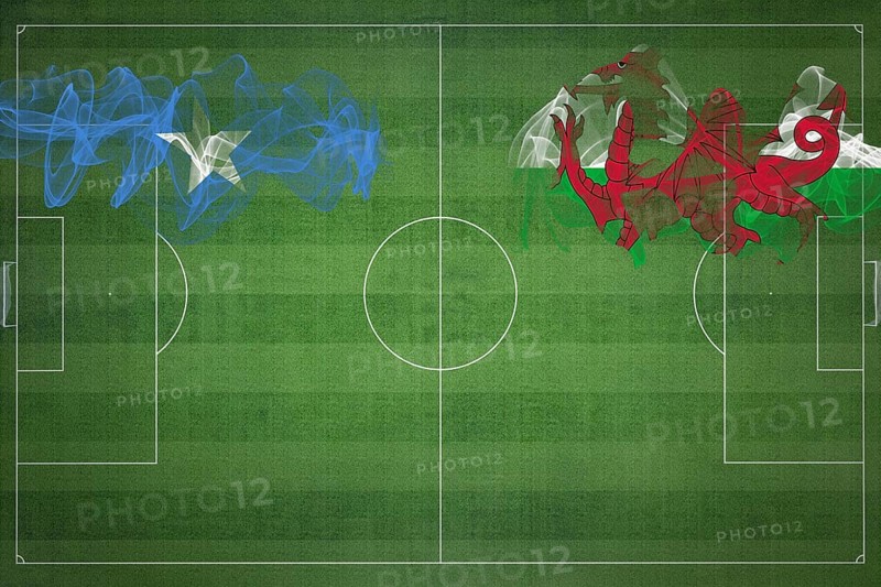 Somalia vs Wales Soccer Match, national colors, national flags, soccer field, football game, Competition concept, Copy space