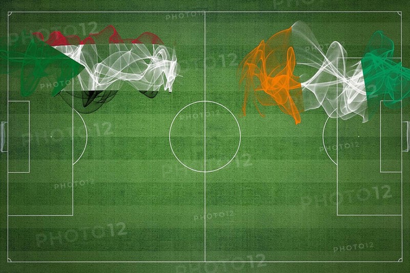 Sudan vs Ivory Coast Soccer Match, national colors, national flags, soccer field, football game, Competition concept, Copy space
