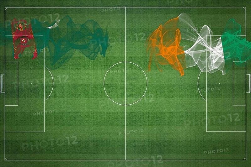 Turkmenistan vs Ivory Coast Soccer Match, national colors, national flags, soccer field, football game, Competition concept, Copy space