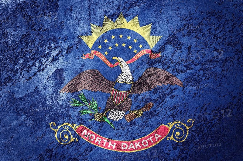 Grunge North Dakota state flag. North Dakota flag background grunge texture