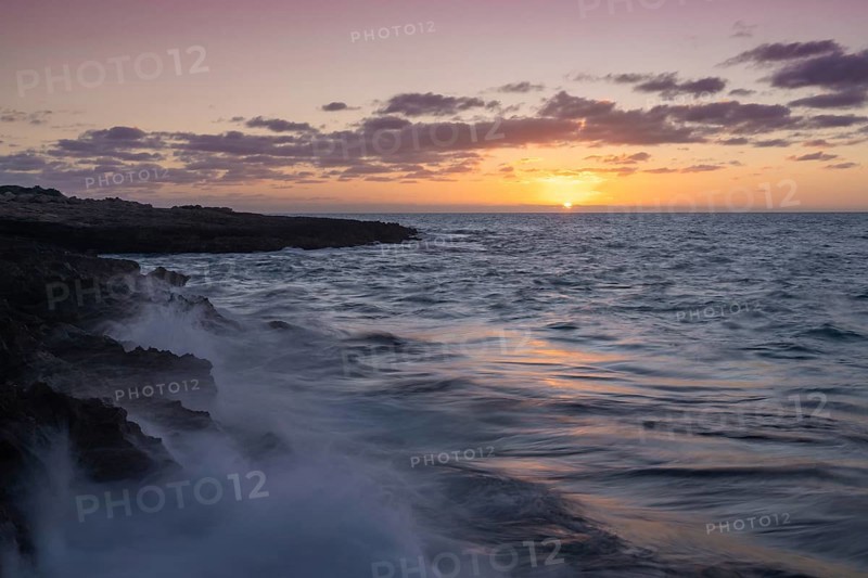 Peaceful sunrise seascape at Cap de ses Salines on Mallorca's southernmost point