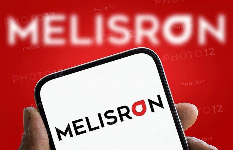 Melisron logo is displayed on smartphone. Melisron Ltd is an Israel based investment company
