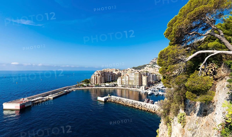 Montecarlo, Monaco, August 2022: panoramic view of the Fontvielle port with blue sky and sea, Europe