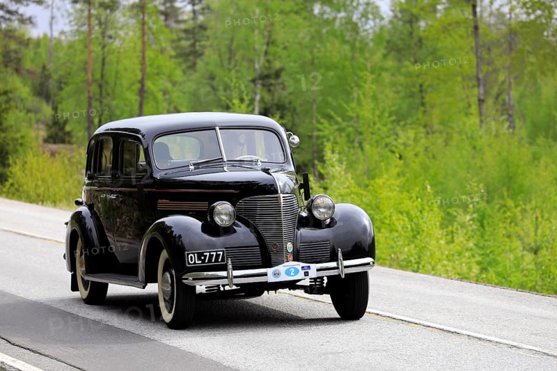 Classic 1930s Chevrolet car on Ascension Day vintage car rally by AHS ry, road 104, Fiskars, Finland. May 26, 2022