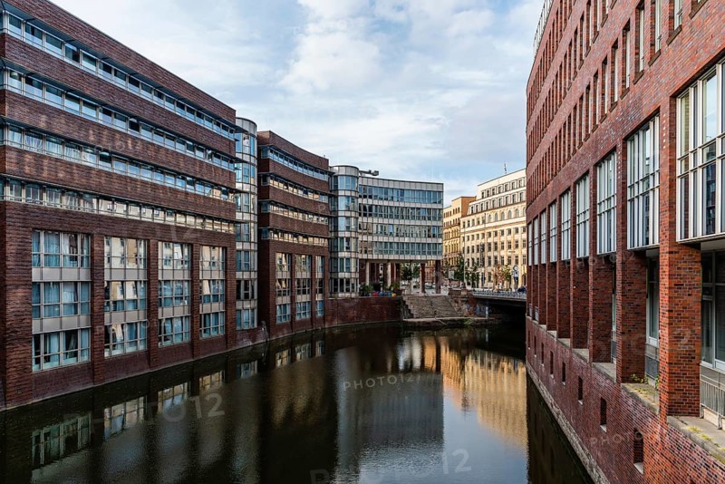 Hamburg, Germany, August 4, 2019: Scenic view of Bleichenfleet Canal in Hamburg view at sunset, Europe