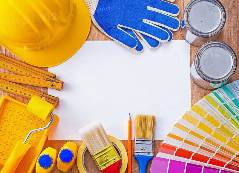 Croup of repair and paint objects on clean sheet of paper construction concept