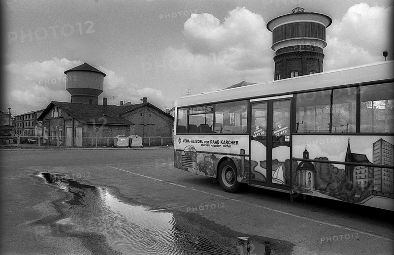 Germany, Angermünde, 20/04/1992, bus station, bus, puddle, Europe