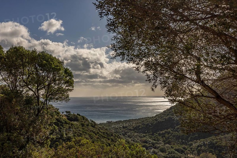 View of the glittering sea and Monte Ferru, Ogliastra, Sardinia, Italy, Europe