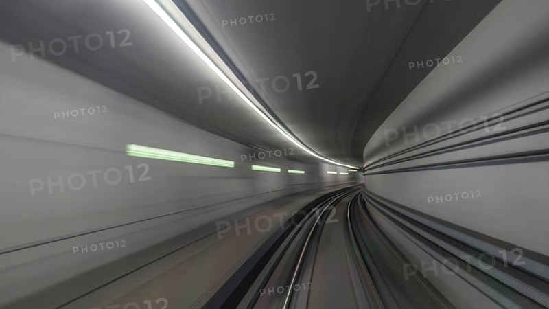 View on subway rails in tunnel from train