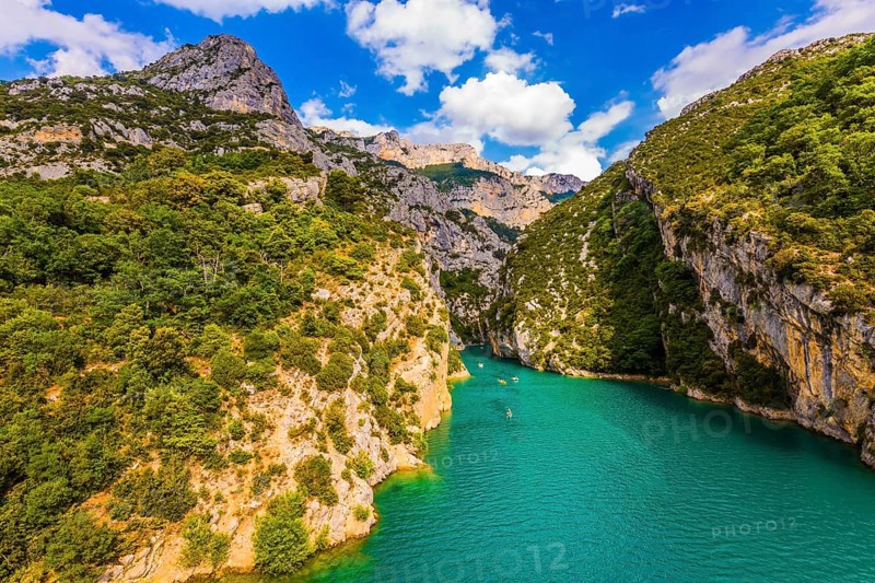 The Provence Alps. Fascinating journey along the mountain river. The Verdon River flow between the sheer cliffs of Verdon Canyon, France. Concept of ecological and active tourism