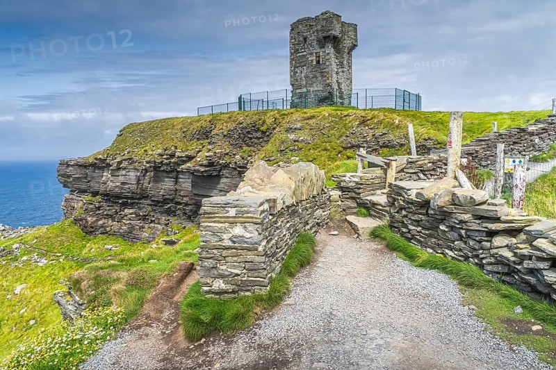 Old Moher Tower on Hags Head, watchtower at the southern end of Cliffs of Moher, popular tourist attraction, Wild Atlantic Way, County Clare, Ireland, Europe