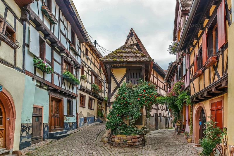 Picturesque historical street in Eguisheim, Alsace, France, Europe