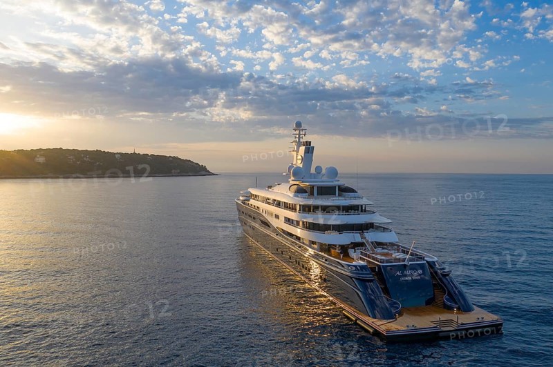 Aerial view of 133 metre motor yacht AL MIRQAB, delivered in 2008 by the German shipyard Kusch Yachts, Peters Schiffbau to Sheikh Hamad bin Jassim bin Jaber bin Muhammad Al Thani, member of the royal family of Qatar, designer Tim Heywood, early in the morning shortly after sunrise at anchor off the Principality of Monaco, Cote d'Azur, Mediterranean Sea