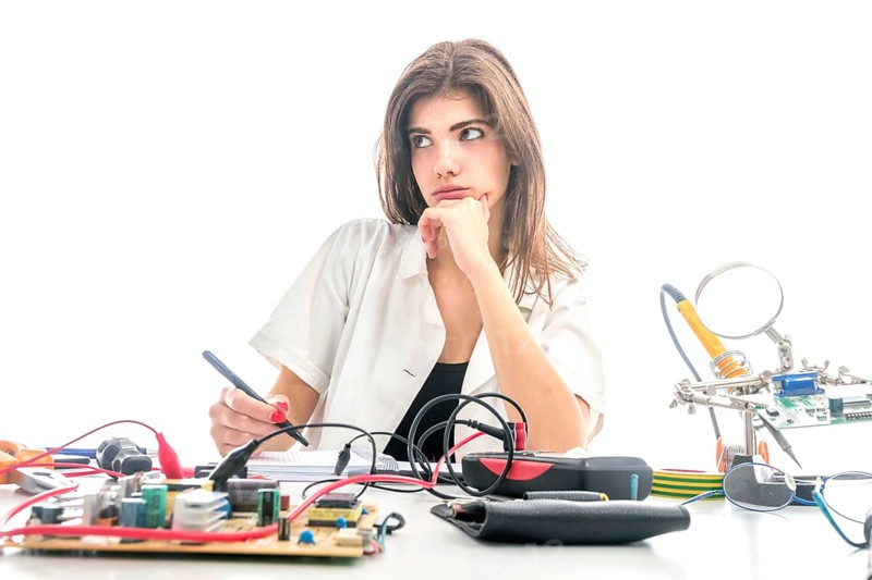 Woman Repairing Computer Part, Service Center, Electronics Repair Service