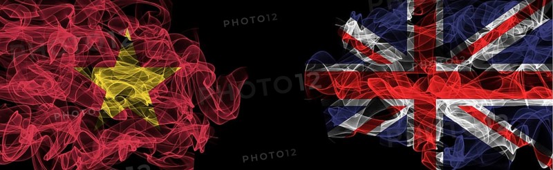 Flags of Vietnam and United Kingdom on Black background, Vietnam vs United Kingdom Smoke Flags