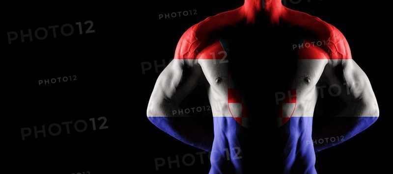 Croatia flag on muscled male torso with abs, black background