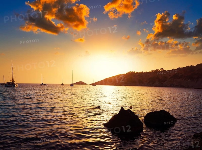 Ibiza cala d Hort with Es Vedra islet sunset in Sant Josep of Balearic Islands