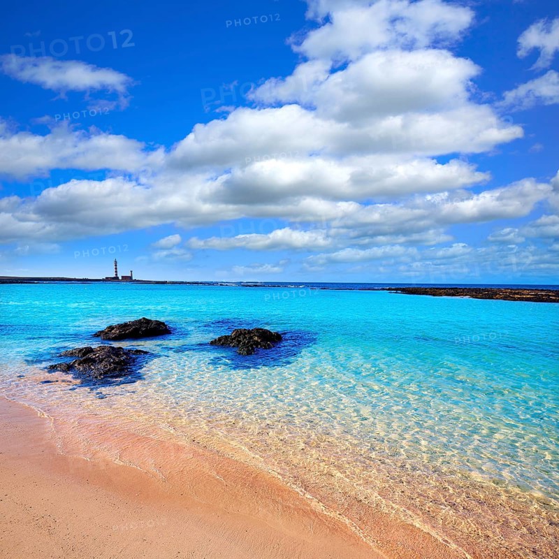 El Cotillo beach and Toston lighthouse at Fuerteventura Canary Islands