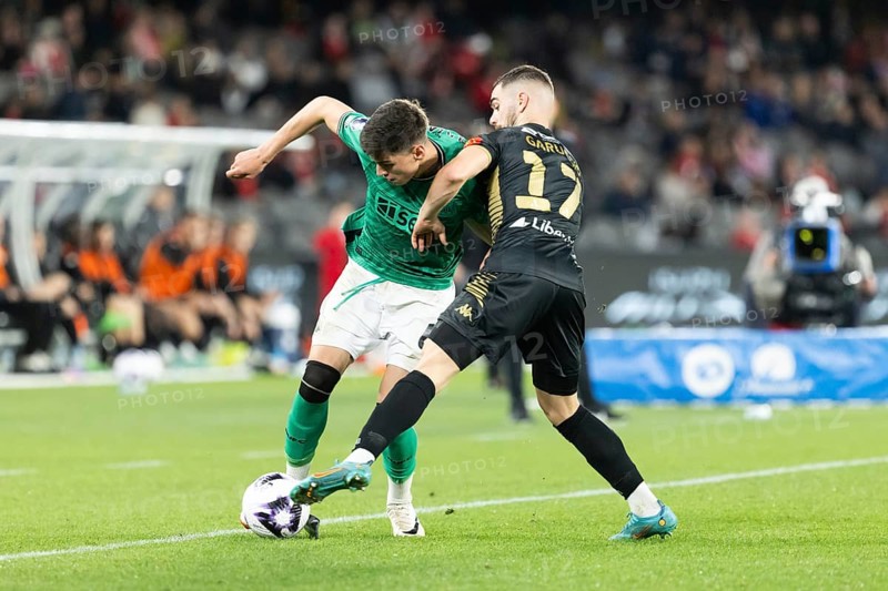 MELBOURNE, AUSTRALIA, MAY 24: Ben Parkinson of Newcastle United competes with Benjamin Garuccio of A-League All Stars Men during the Global Football Week at Marvel Stadium on May 24, 2024 in Melbourne, Australia, Oceania