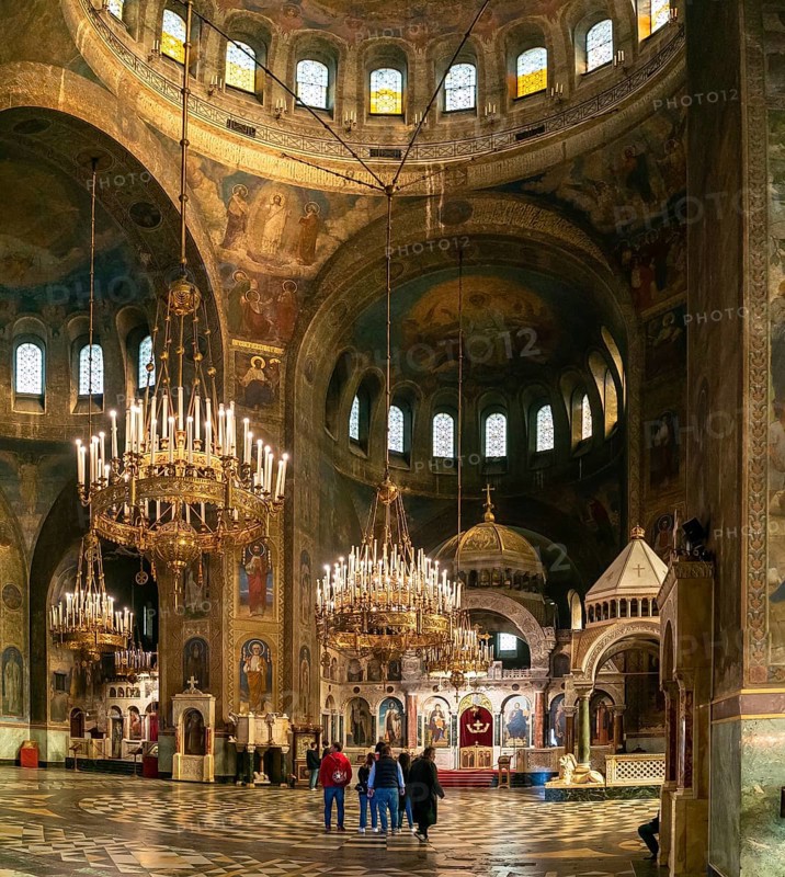 Sofia, Bulgaria, 30 October, 2022: interior view of the main hall of the Alexander Nevsky Cathedral with ornate chandeliers, Europe