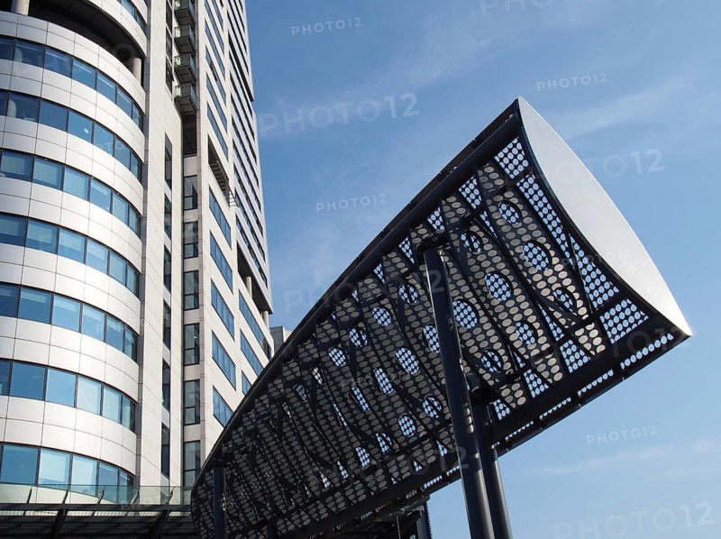 Leeds, west yorkshire, united kingdom, 16 july 2019: close up of bridgewater tower in whitehall place leeds west yorkshire and wind deflectors put in place to manage turbulence on the road
