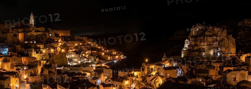 Famous cave church Saint Mary of Idris and the cathedral of Matera at night, Italy, Europe