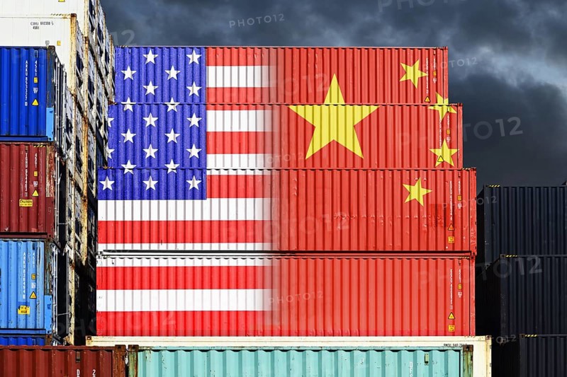 Stacked containers with flags of USA and China, photomontage