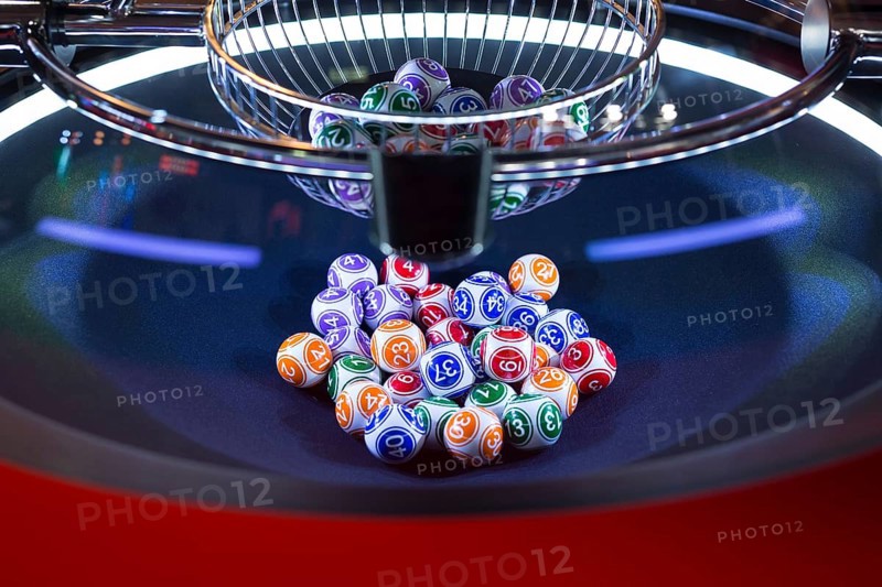 Colourful lottery balls in a rotating bingo machine