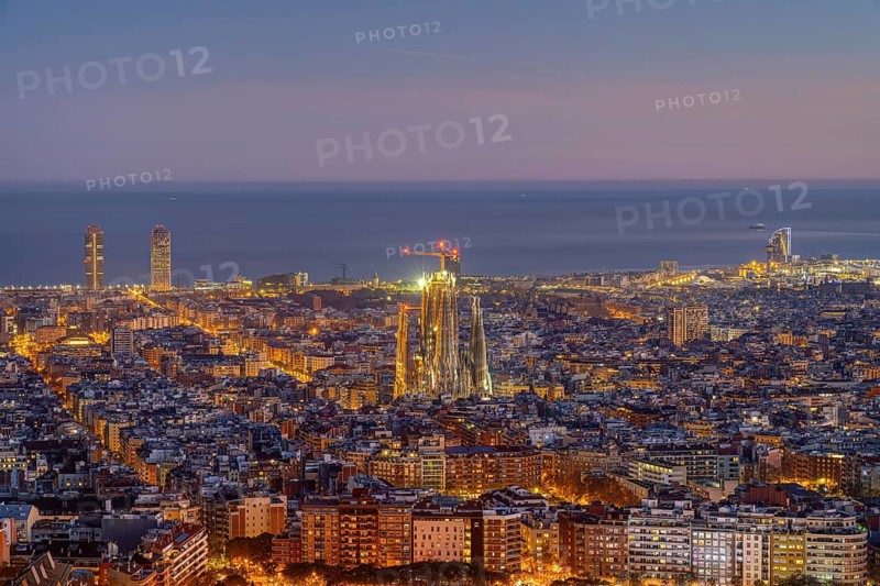 The Barcelona skyline with the famous Sagrada Familia at dusk