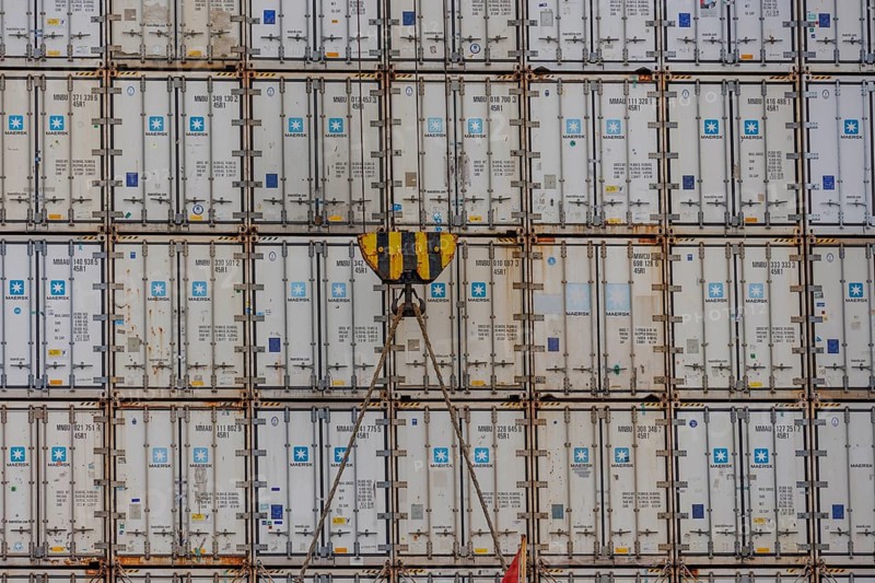 Stack of freight containers in the harbour, arranged in even rows, hook in the middle, Bremerhaven, Bremen, Germany, Europe