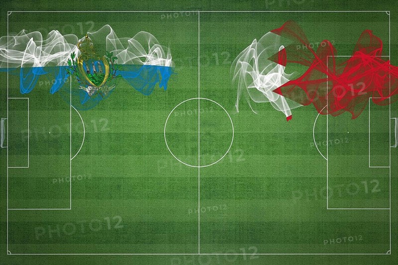 San Marino vs Bahrain Soccer Match, national colors, national flags, soccer field, football game, Competition concept, Copy space