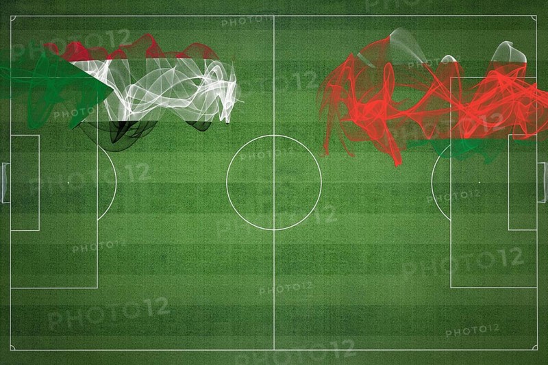 Sudan vs Oman Soccer Match, national colors, national flags, soccer field, football game, Competition concept, Copy space