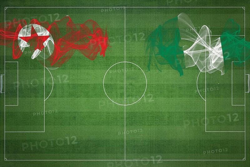 North Korea vs Nigeria Soccer Match, national colors, national flags, soccer field, football game, Competition concept, Copy space