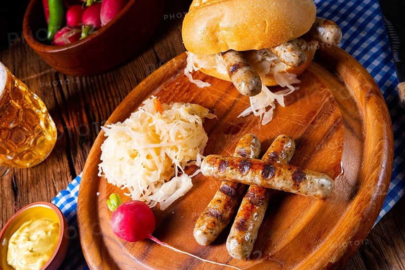 Rustic Thuringian bratwurst with sauerkraut and roll