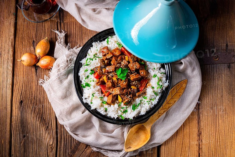 Tajin beef stew with rice, peppers and sesame seeds