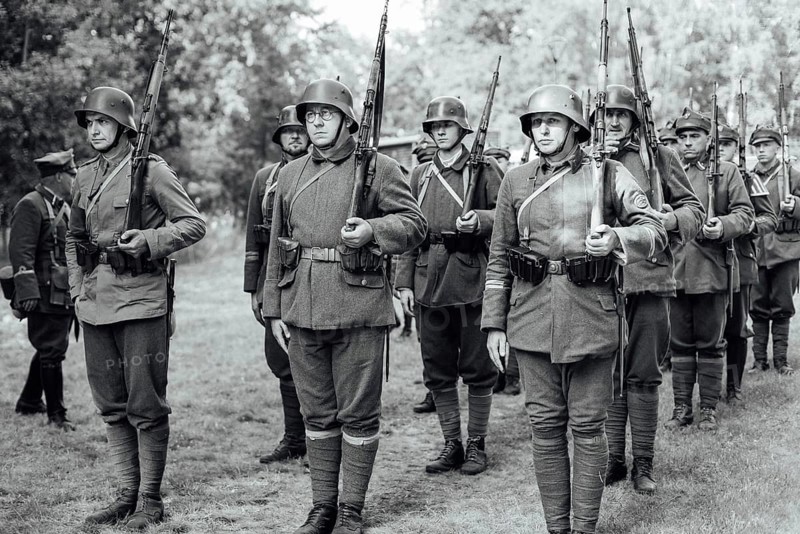 LUBIN, POLAND - AUGUST 8, 2020:, A staging of the Battle of Warsaw from 1920, in which the Polish army defeated the Bolshevik aggression. 100th anniversary of the battle. On picture Polish soldiers