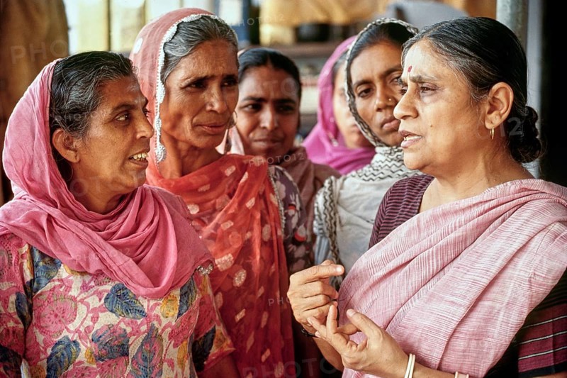 Ela Bhatt Gandhian social worker talking with members, Gujarat, India, Asia