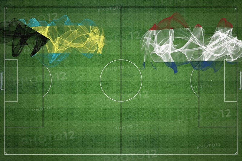 Bahamas vs Netherlands Soccer Match, national colors, national flags, soccer field, football game, Competition concept, Copy space