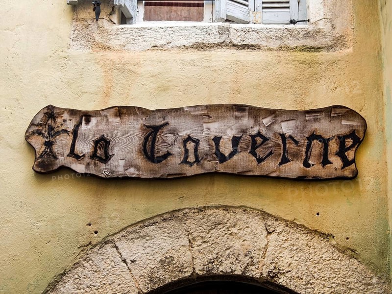 A wooden sign on a house wall in France Austria