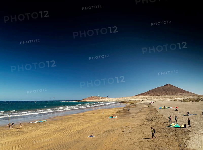 El medano tourist beach and montana roja famous landscape in tenerife spain