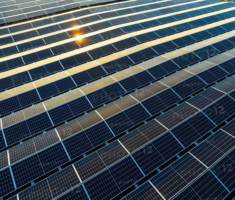 Industrial warehouse with roof loaded with solar panels