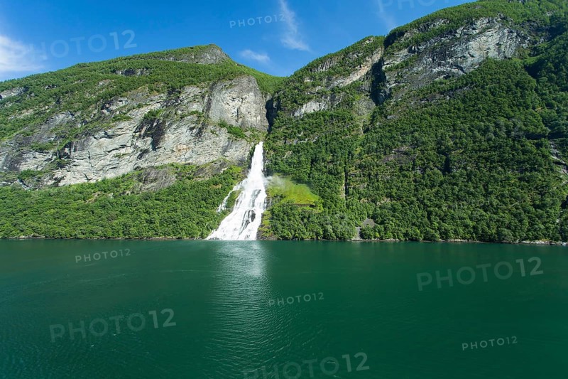 Image shows a waterfall in Geiranger ford in norway