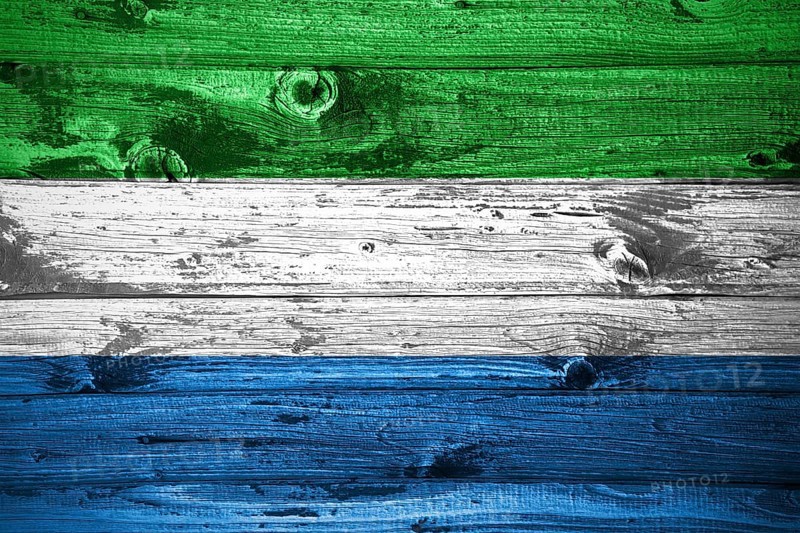 Sierra Leone flag on wooden planks background wood flag